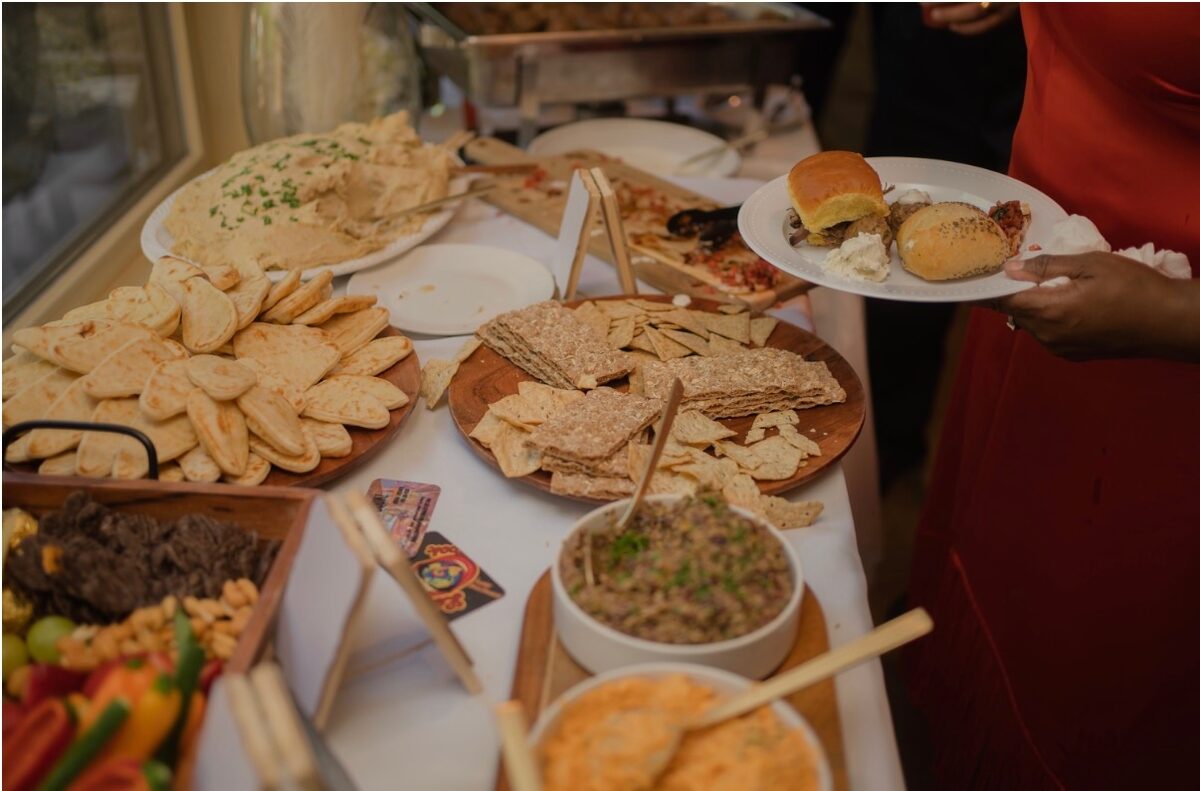 A full buffet spread with pita, dips and boards